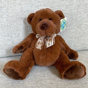 Brown plush teddy bear.